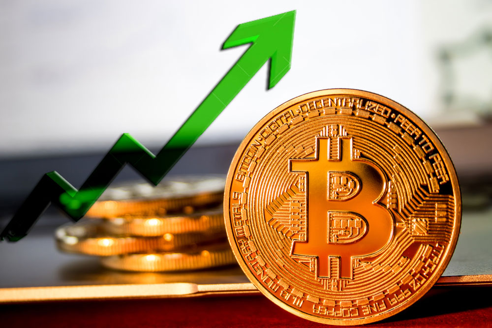 Giá Bitcoin bật tăng qua mức 21.000 USD