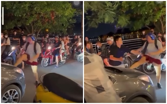 Hà Nội: Cô gái lao ra phố chặn ô tô, xảy ra xô xát với nhóm người đàn ông