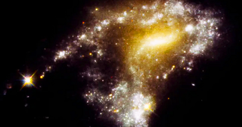 Kính Hubble tìm thấy 'đuôi cá' đầy sao của 12 thiên hà va chạm