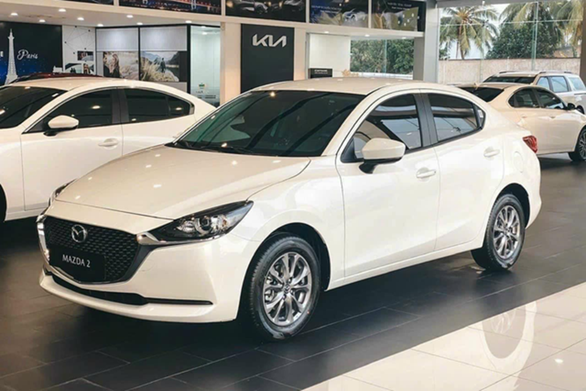 Mazda Việt Nam điều chỉnh giá bán ôtô, Mazda2 tăng tới 33 triệu đồng - Hình 7 Mazda Viet Nam dieu chinh gia ban oto, Mazda2 tang toi 33 trieu dong-Hinh-7