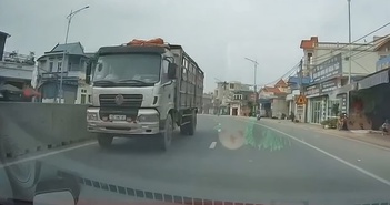 Phẫn nộ xe tải 'hiên ngang' chạy ngược chiều trên quốc lộ