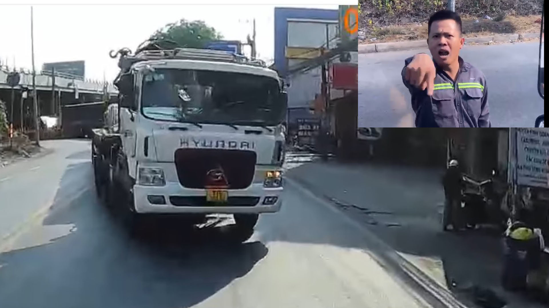 Xe tải chạy ngược chiều, tài xế đòi đánh người khác khi bị chặn đường- Ảnh 1.
