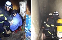 Giải cứu 2 người thoát khỏi vụ cháy nhà trong đêm trên phố Lò Đúc