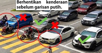 Đi xe máy dừng đèn đỏ quá vạch có thể bị đi tù? Đi xe máy dừng đèn đỏ quá vạch có thể bị đi tù?