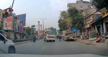 Xe trộn bê tông đi ngược đường giữa phố Xe trộn bê tông đi ngược đường giữa phố