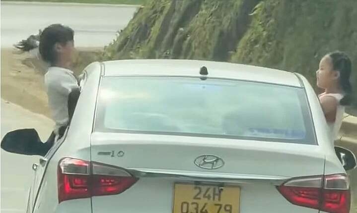 Để trẻ con thò người qua cửa sổ xe bị phạt thế nào?